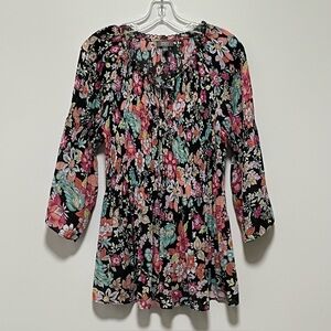 ninety clothing co Feminine multi-colored floral v-neck with a tie detail dress